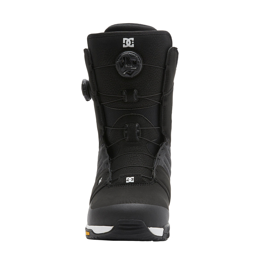 Front view of the Men’s Judge BOA® Snowboard Boots by DC Shoes in black, showcasing the advanced Dual Zone BOA® Fit System for precise lacing control, visible stitching, and a textured surface. The rugged sole offers excellent traction, with small DC Shoes logos displayed on the toe and tongue.