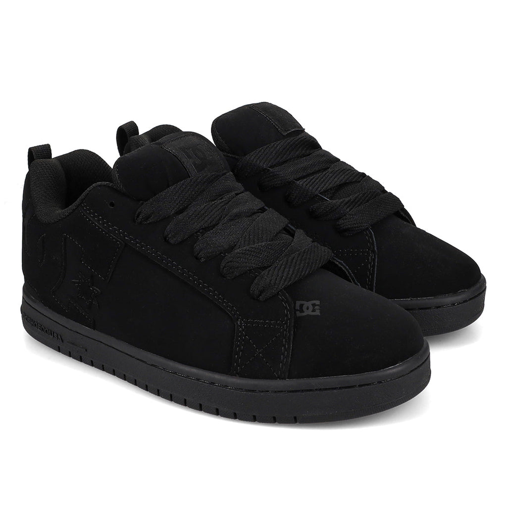 Pair of black sneakers on a white background