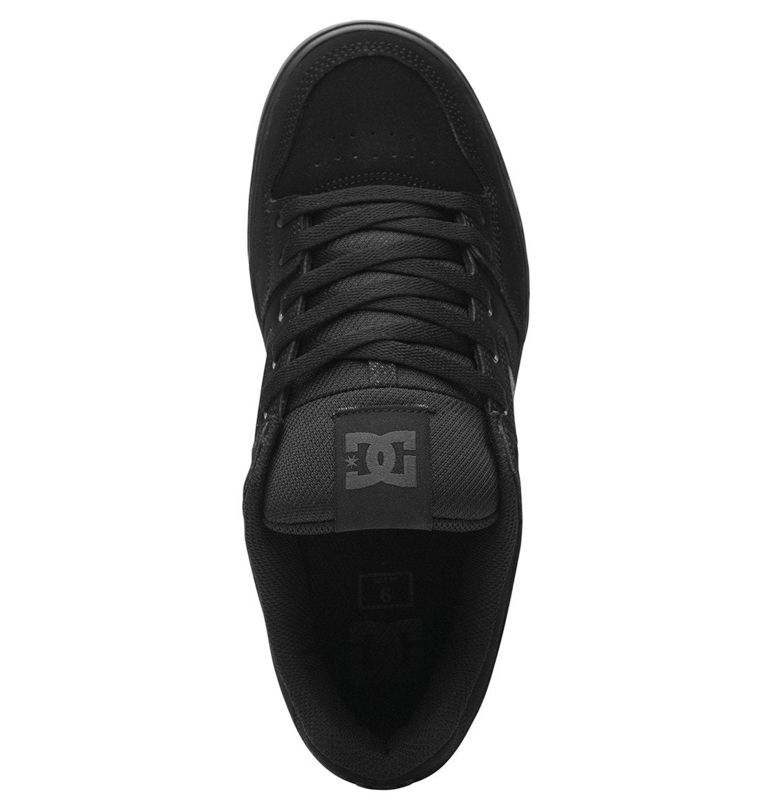 A top view of the DC Shoes Men’s Pure Shoes in black, featuring black laces, a perforated toe area, and a prominent DC logo on the tongue—these versatile sneakers are crafted for both comfort and style.