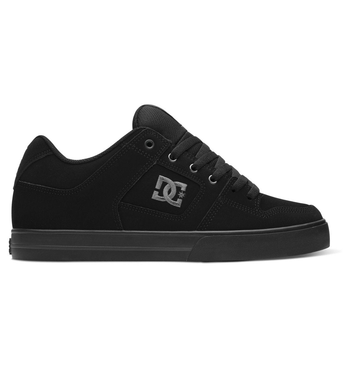 The Men’s Pure Shoes by DC Shoes are black, low-top sneakers featuring black laces and a grey DC logo on the side. Designed with a flat sole and a simple, clean look, these men’s shoes offer comfort and style, making them ideal for everyday wear.