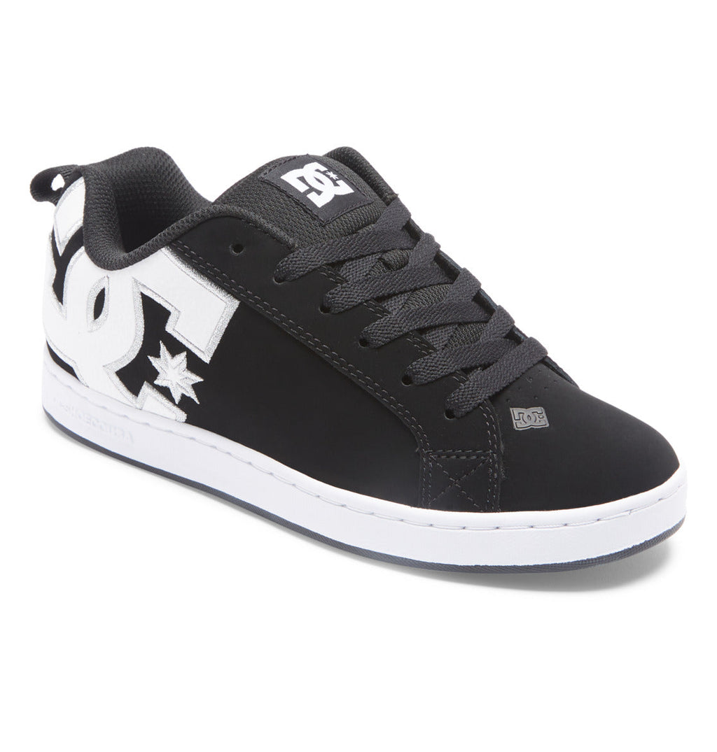 The Women’s Court Graffik Shoes by DC Shoes feature a chunky black design with a contrasting white sole, bold white DC logo on the side, black laces, and subtle white stitching. Shown from an angled view on a white background, these sneakers are ideal for bringing iconic ’90s flair to your women’s footwear collection.