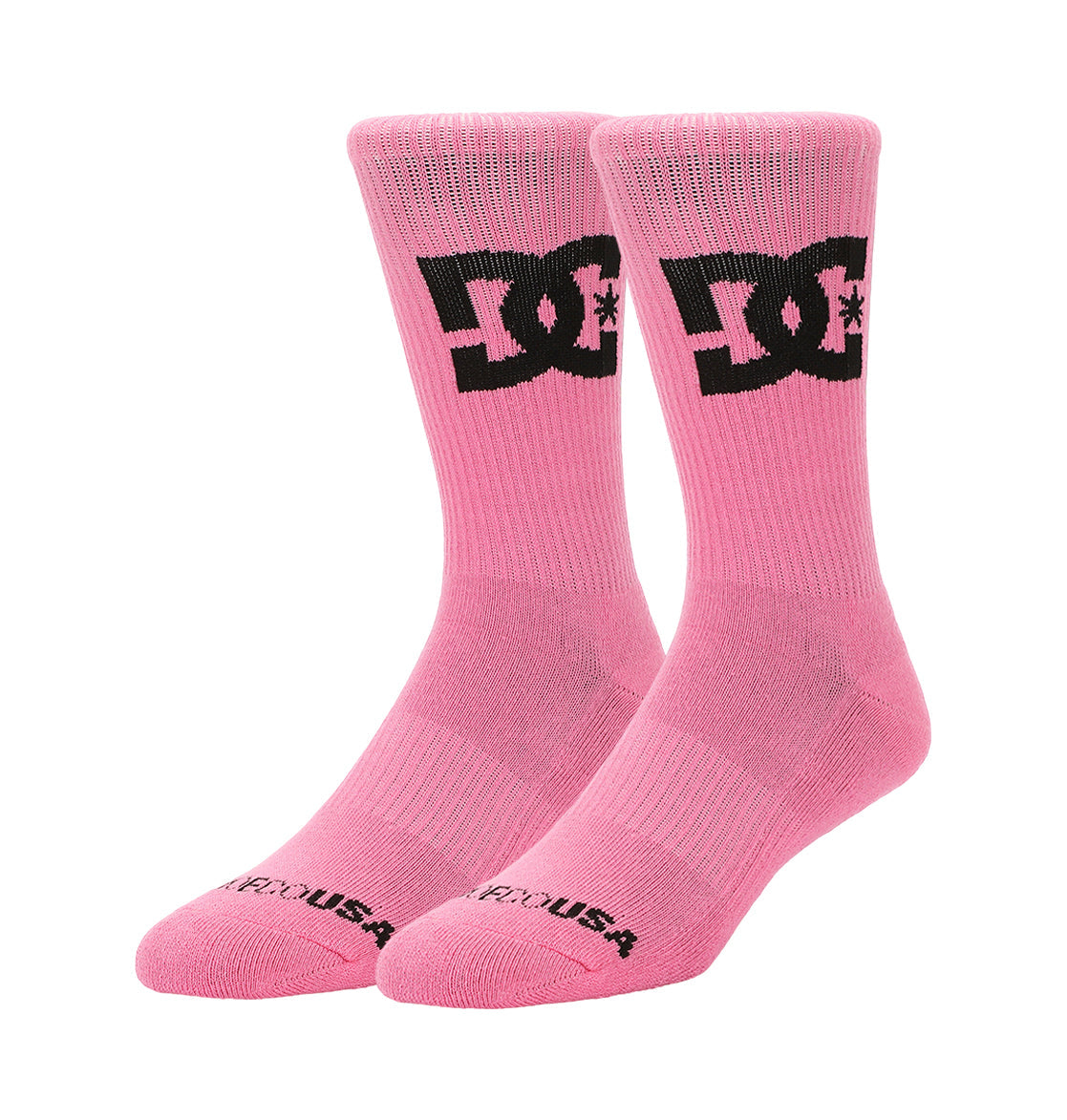 The DC Shoes Big Star Logo Crew Socks 3-Pack features pink crew socks with a black DC logo near the top and "DCSHOEUSA" text in black on the toes.