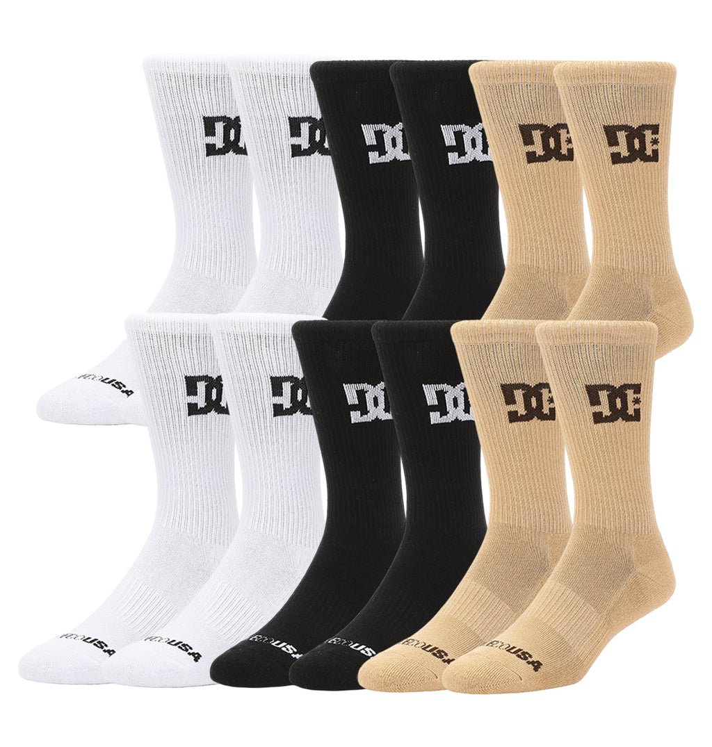 The DC Shoes Crew Socks 6-Pack features comfortable crew socks in white, black, and beige, each with the DC logo on the side and DC USA text on the toes.