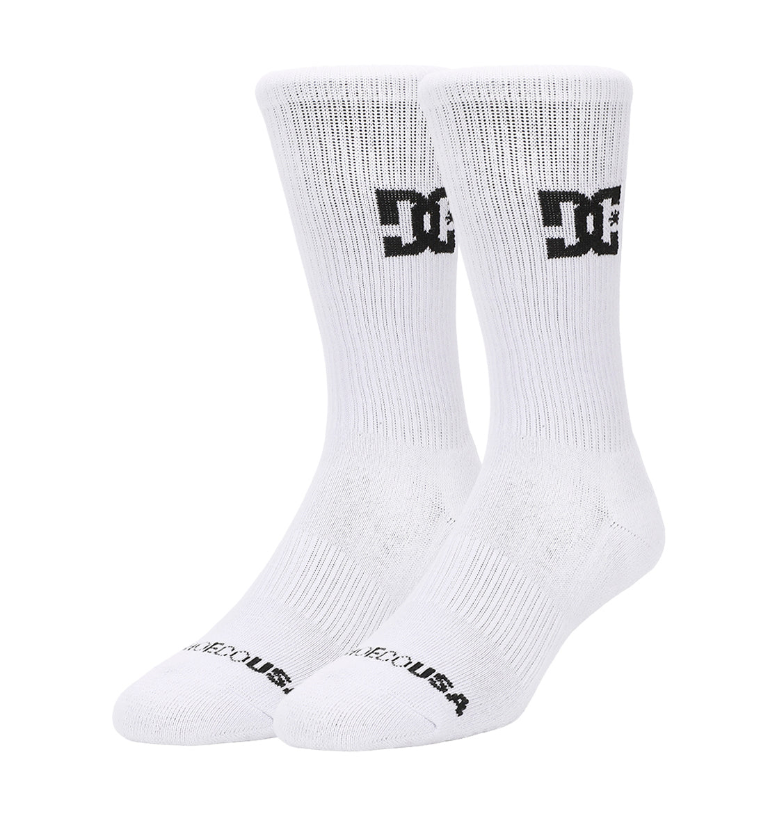 The DC Shoes Crew Socks 6-Pack features white crew socks with a black DC Shoes logo near the top and "DC SHOES USA" in black on the toes, all displayed upright against a plain white background.