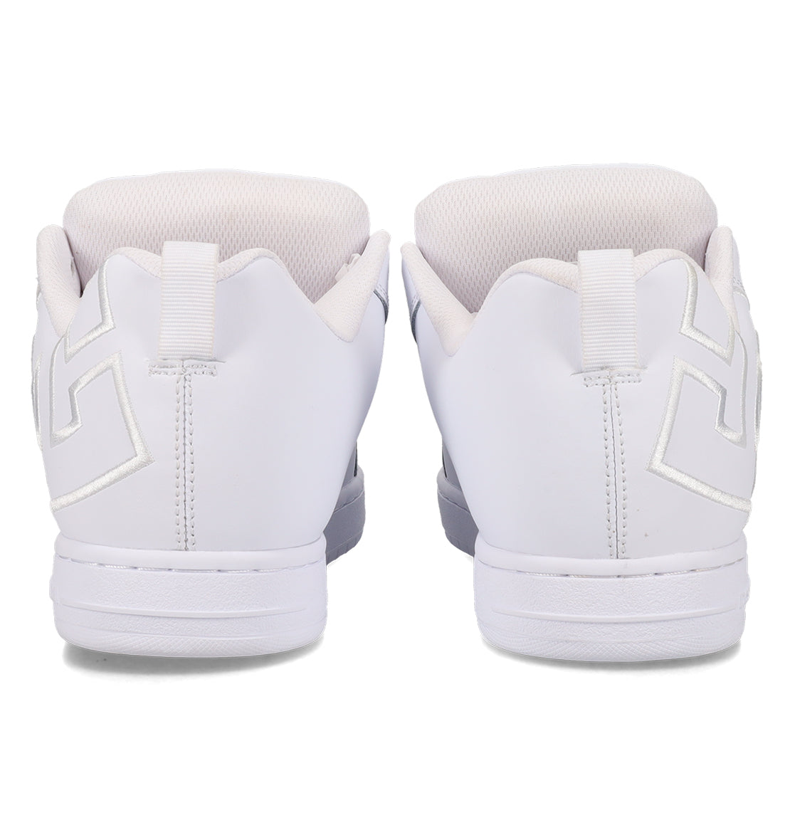 A pair of DC Shoes Men’s Court Graffik Shoes in white, shown from the back with geometric stitching and chunky skate shoe-inspired white soles, placed side by side on a plain white background.
