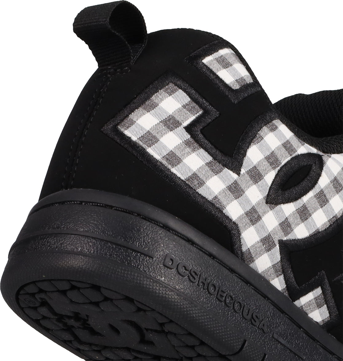 Close-up of the heel and side of men's Court Graffik shoes by DC Shoes, showing the puffy silhouette, bold DC logo lettering, DCSHOECOUSA embossed on the sole, and a black-and-white checkered pattern for a signature look.