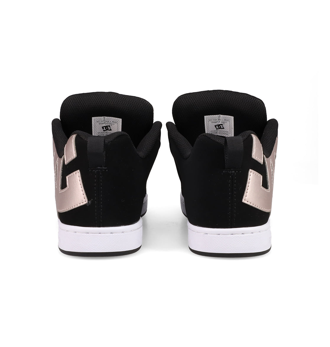 A pair of DC Shoes Women's Court Graffik sneakers with a puffy black silhouette, white soles, and metallic rose gold heel accents is shown from the back against a white background.