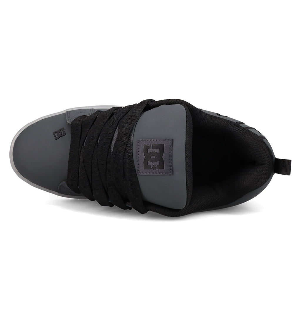Top view of the Men's Court Graffik SE Shoes by DC Shoes in black and dark gray, featuring wide black laces, a puffy silhouette, DC logo on the tongue, padded collar, and a heel loop.