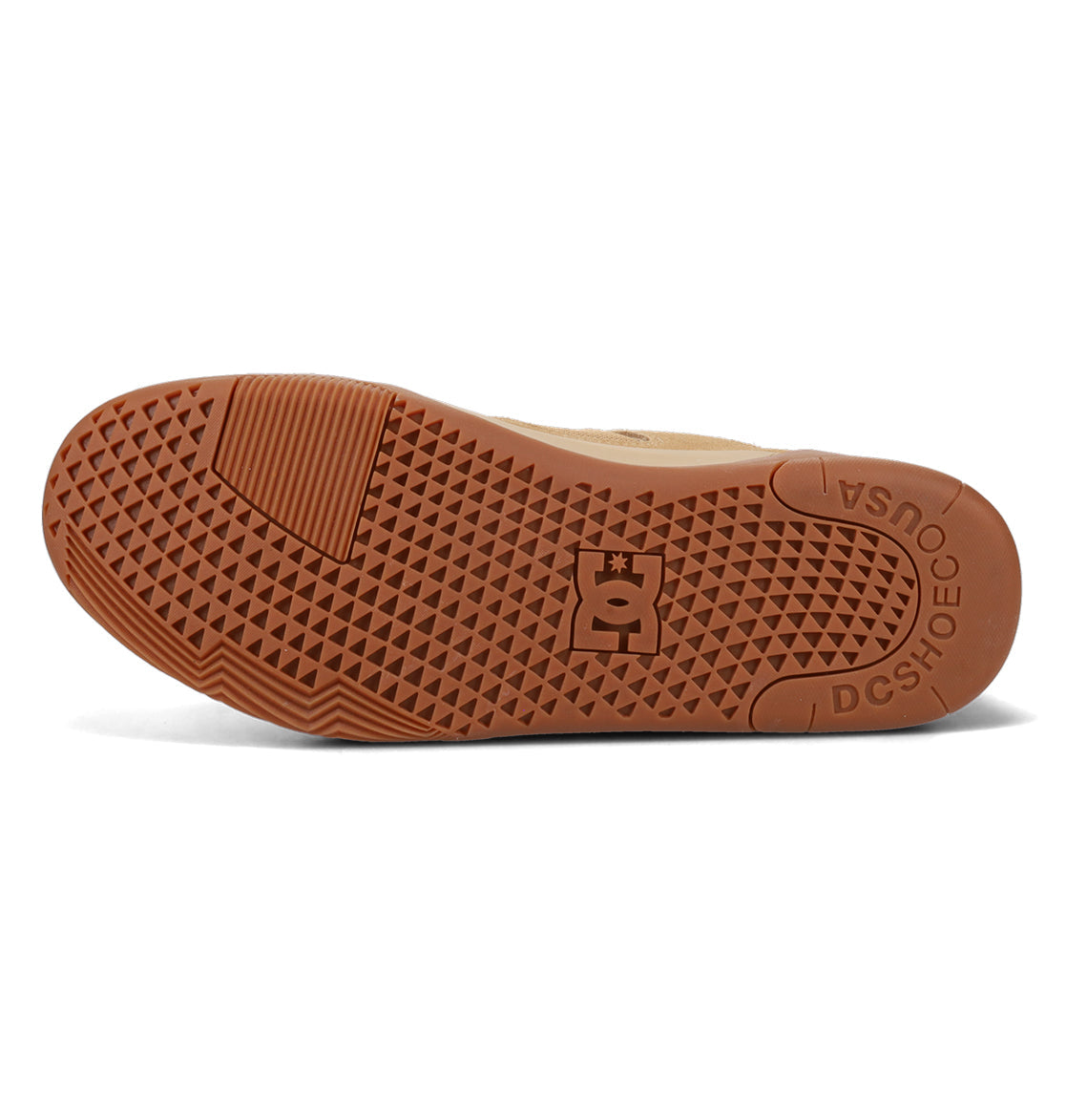 Featuring a brown sole with a textured geometric pattern, the Men’s Metric Skate Shoes by DC Shoes display the iconic DC Shoes logo at the center and “DC SHOES USA” text near the heel. Specially designed for skateboarding, their durable outsole provides enhanced grip and impact protection.