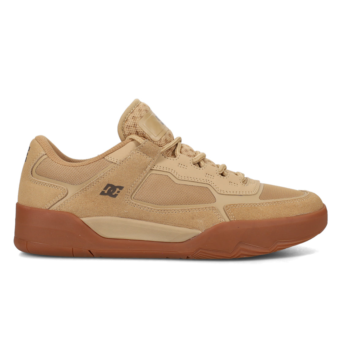 Introducing the DC Shoes Men’s Metric Skate Shoes: versatile athletic sneakers featuring tan mesh and suede panels, durable laces, a gum brown outsole for lasting grip, and a subtle DC Shoes logo on the side—expertly designed to deliver reliable impact protection for skating.