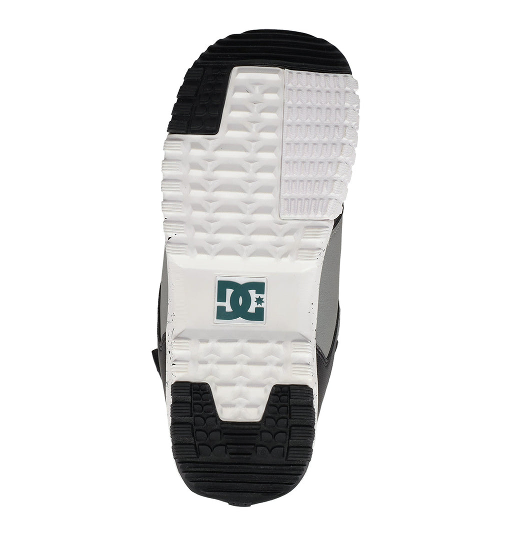 Featuring a white and black tread pattern on the sole, the DC Shoes logo appears in green at the center—drawing inspiration from snowboard boots like the Men’s Control Snowboard Boots by DC Shoes, this design focuses on delivering both performance and grip.