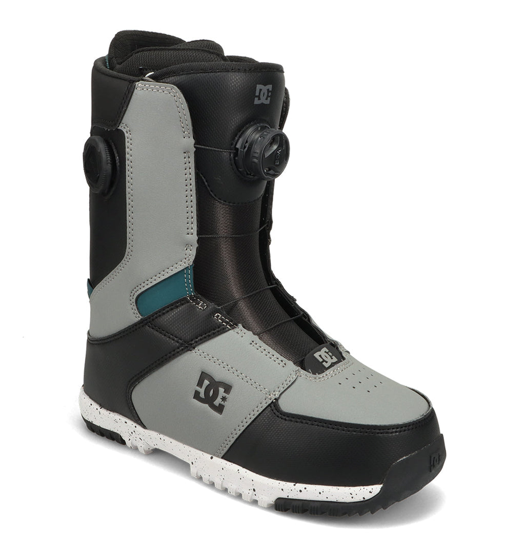 The Men’s Control Snowboard Boots by DC Shoes feature a gray and black design with a BOA lacing system, a white speckled sole, and the signature DC Shoes logo on the side—crafted for optimal snowboarding performance and comfort.