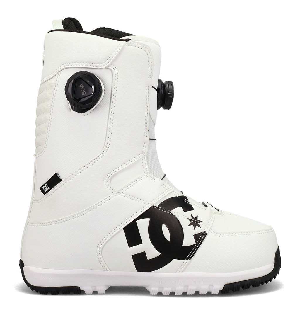 A men’s Control Snowboard Boot by DC Shoes in white with black accents, featuring a BOA dial lacing system and a black DC Shoes logo on the side, shown from the left.