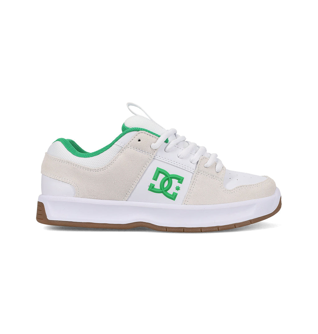 The DC Shoes Men's Lynx Shoes feature a white and light beige design with green accents, lining, and side logo. A white sole with brown bottom adds classic style and board-ready grip.