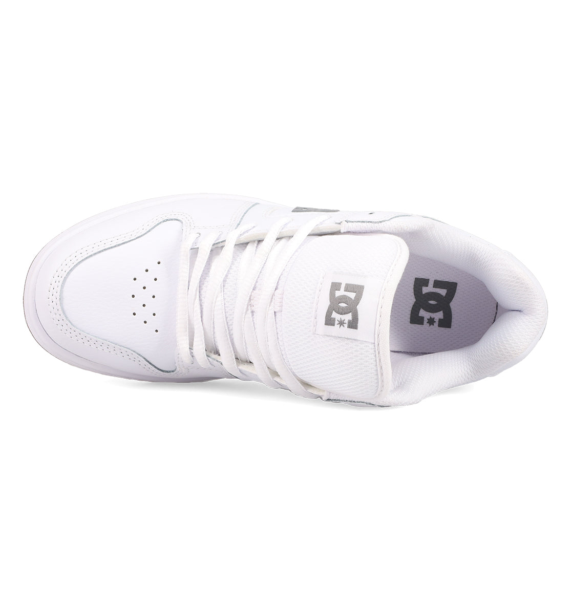 Top-down view of a white Women’s Manteca 4 Shoe by DC Shoes featuring white laces, a perforated side panel, and gray DC branding on the tongue and heel collar—all presented on a white background to highlight its performance-driven design.