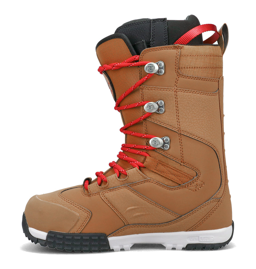 Introducing the DC Shoes Men’s Premier Hybrid Snowboard Boots: these brown snowboard boots showcase striking red laces threaded through metal eyelets, complemented by a black padded tongue and a durable black-and-white sole. Expertly crafted for winter sports, these boots combine robust construction with innovative design for superior performance on the slopes.