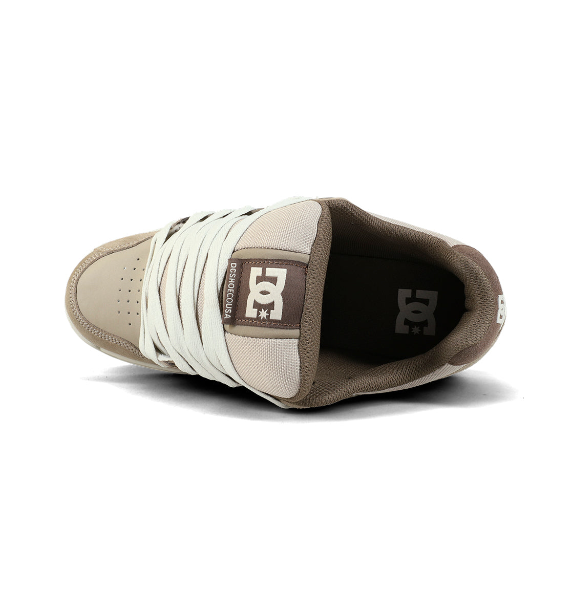 The DC Shoes Men's Stag Shoes, shown in beige and brown from above, feature an oversized puff, white laces, logo on the tongue, padded collar, and a durable cupsole for comfort.