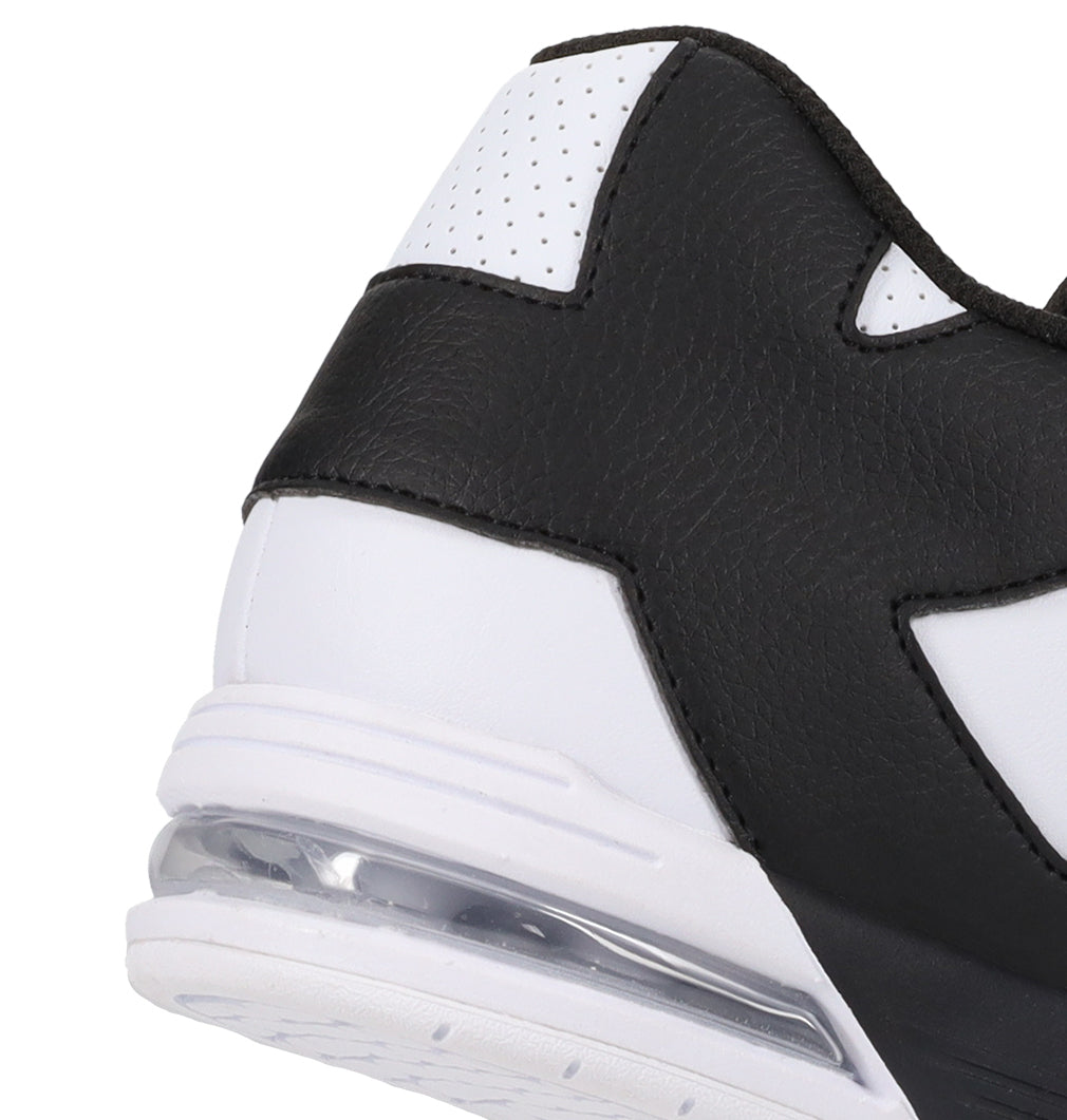Close-up of the heel of the DC Shoes Men’s Command, a white sneaker with bold black overlays, visible air cushioning in the sole, and perforated details near the collar—melding future-proof comfort with classic DC bulk and unmistakable brand style.