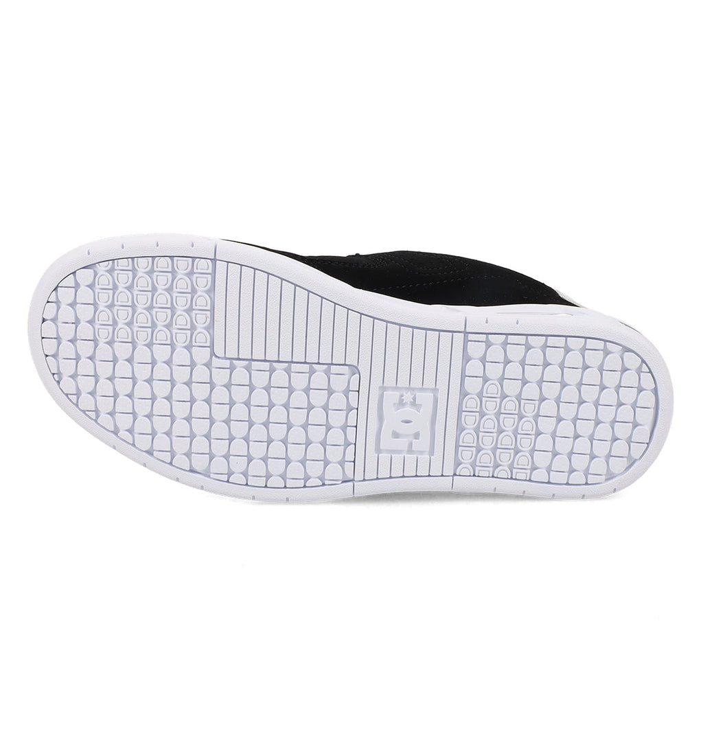 The image shows the white rubber sole of the Women’s Command Shoes by DC Shoes, featuring a textured grip pattern, signature cushioning for all-day comfort, and a small crown logo near the heel.