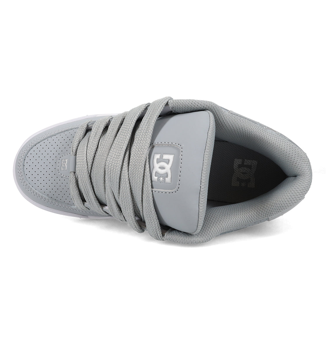 Top view of the Women’s Command Shoes in gray by DC Shoes, featuring a perforated toe, wide tongue with the DC Shoes logo, mesh lining, and flat laces. Signature cushioning ensures classic comfort and retro energy inspired by the iconic DC Command line, with branding also visible on the insole.