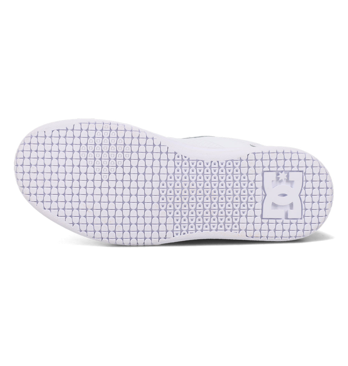 The image shows the white sole of the Women’s Astrix Shoes by DC Shoes, featuring a textured grip pattern tailored for street skateboarding and a DC Shoes logo near the heel, ensuring optimal board control.
