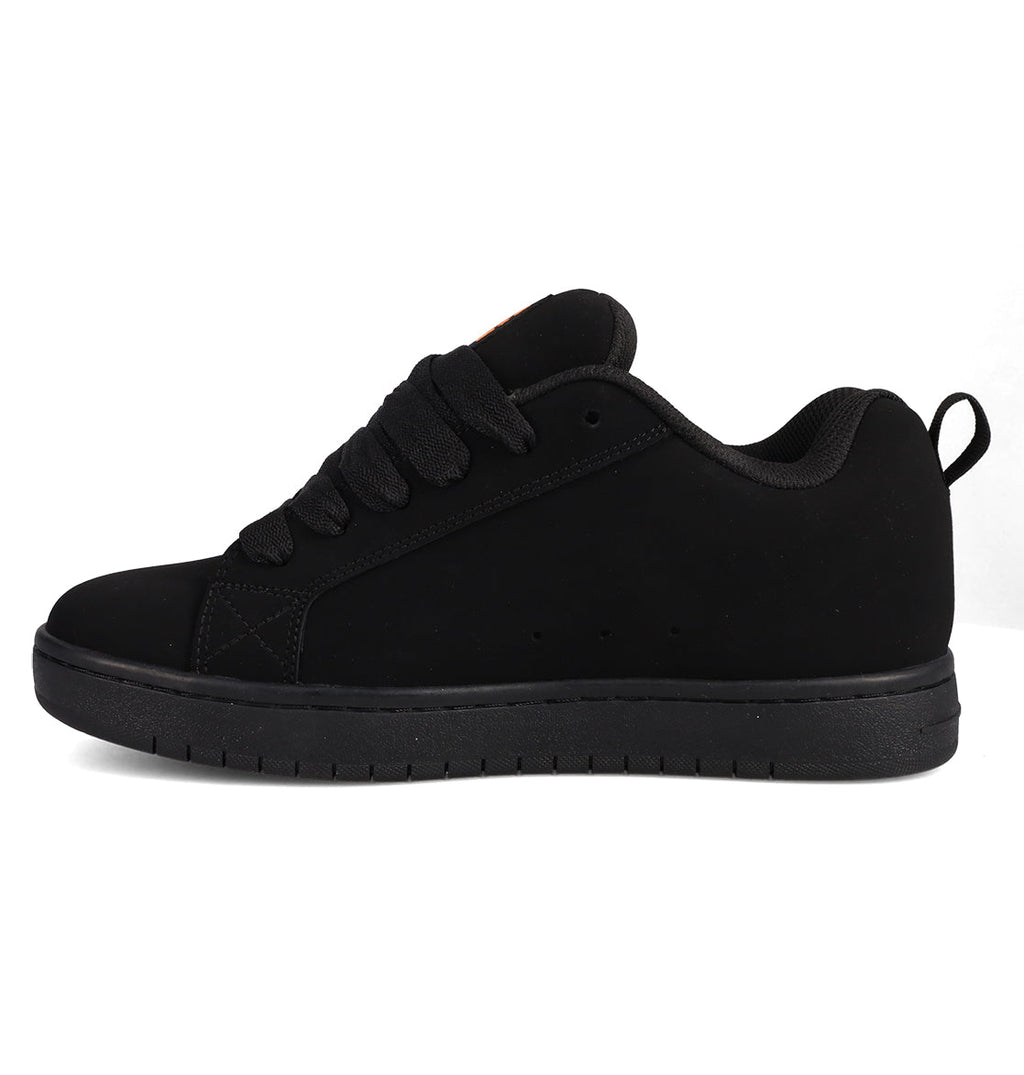 The Men’s Court Graffik Day Of The Dead by DC Shoes is a black low-top sneaker featuring black laces, black stitching, and a black rubber sole, shown in a side view on a white background—part of the exclusive Day of the Dead Collection.