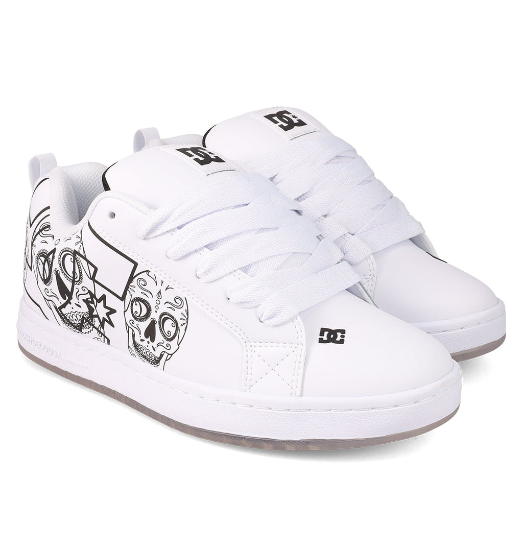 Experience fresh style with the Men’s Court Graffik Day of the Dead skate shoes by DC Shoes. These low-top sneakers showcase thick laces and striking black graphic designs—including skulls and stars—on a white base, all part of the exclusive Día de los Muertos Collection. A subtly patterned white sole completes their bold, stylish look.