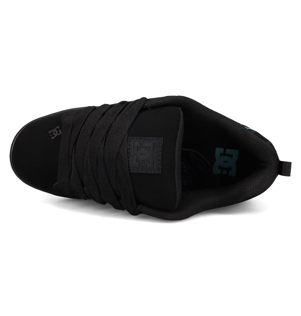 Top view of the Women’s Court Graffik Day Of The Dead sneaker from DC Shoes, featuring wide black laces and the DC Shoes logo on the tongue and inner sole. The shoe includes a padded collar and a pull tab at the heel.