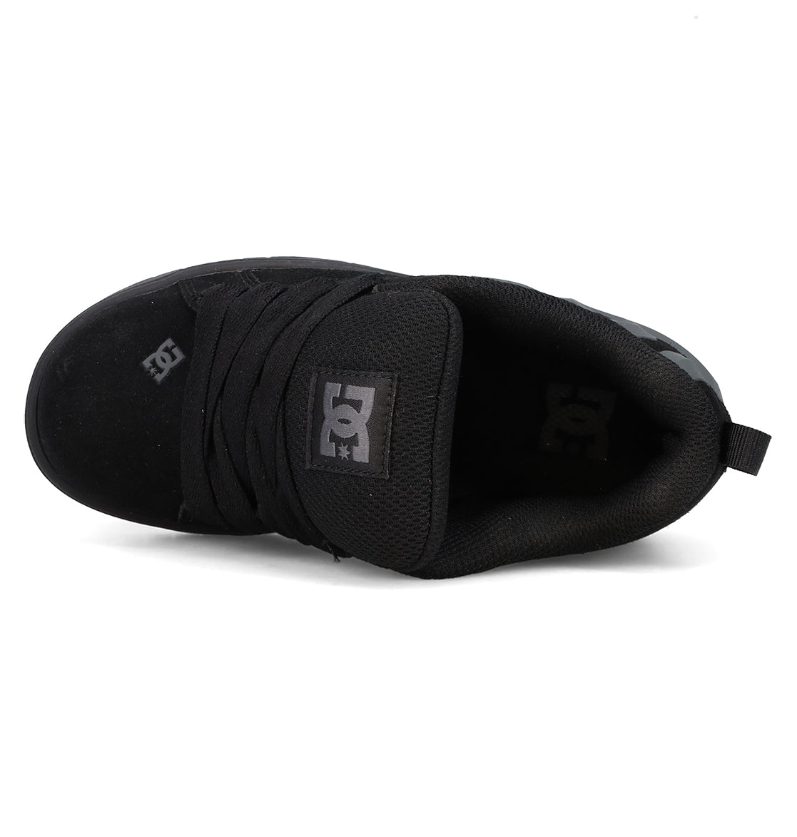 Top view of a black DC Shoes Kids’ Court Graffik Beveled Special Edition skate shoe, featuring black laces and prominent white DC branding on the tongue and side. The shoe showcases a puffy silhouette, low-top design, and a convenient pull tab on the heel.