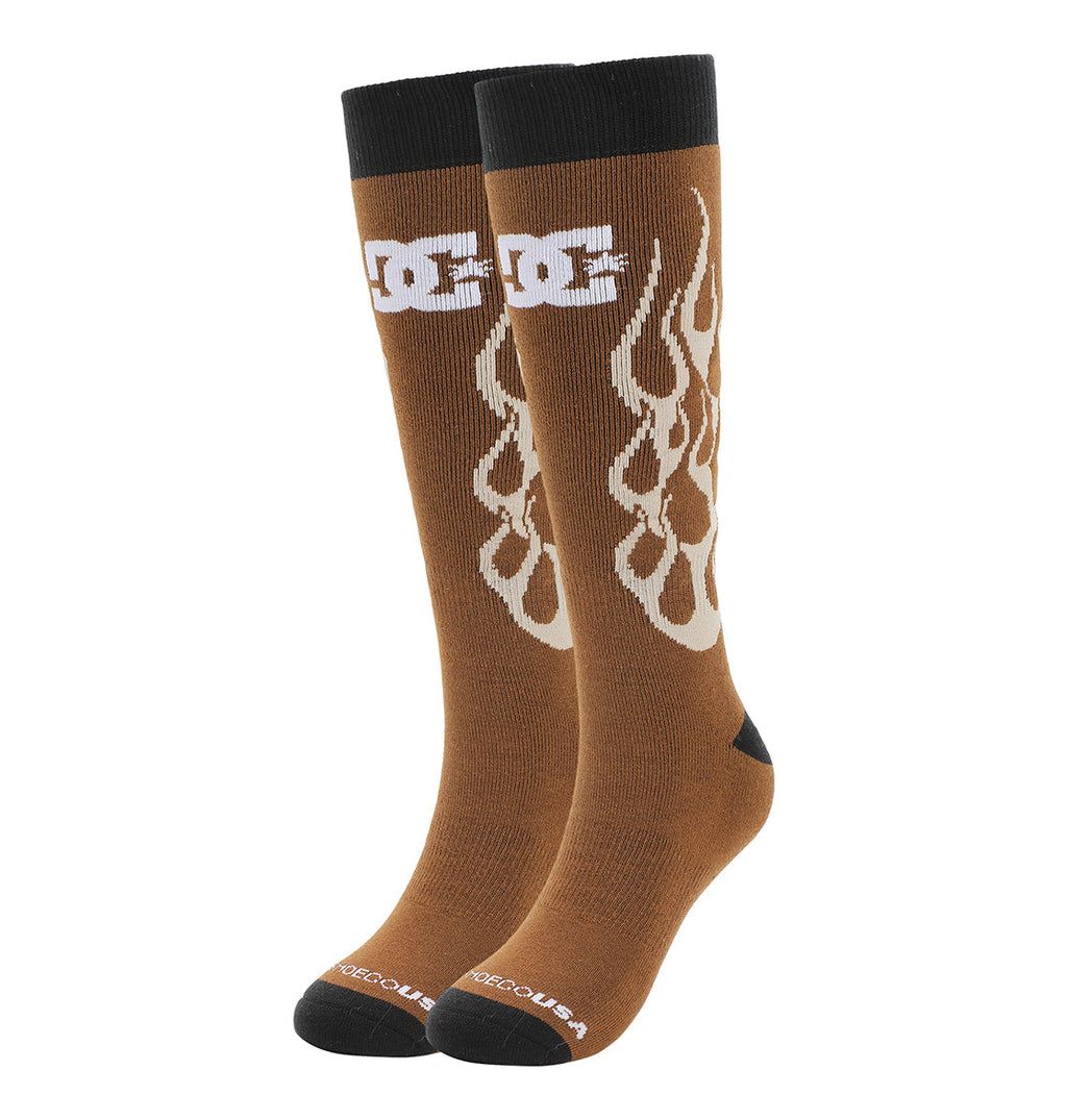 A pair of brown knee-high DC Shoes Performance Socks with black cuffs and toes, white flame designs on the sides, and a bold white logo near the top. "DC Shoes" is printed in small white letters near the toes.