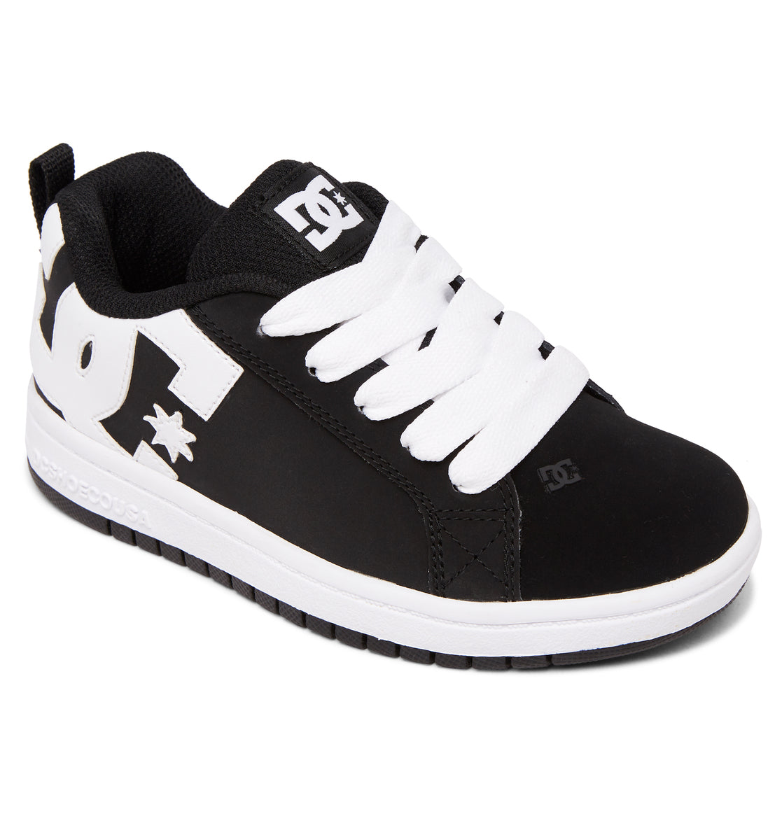 A kids’ skate shoe from DC Shoes, the Kids’ Court Graffik Shoes feature a classic black and white colorway, puffy silhouette, white laces, an oversized DC logo on the side, and a white sole with a black bottom—perfect for young fans of this iconic style.