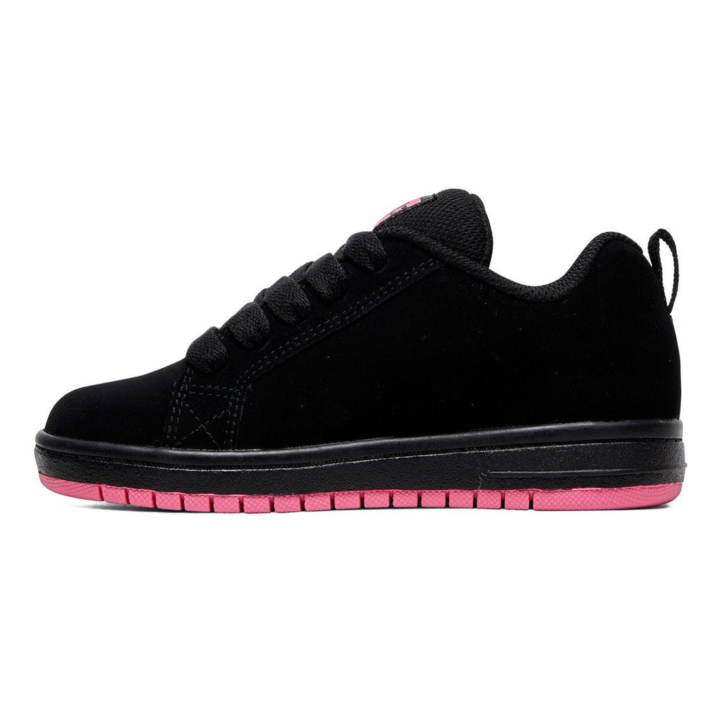 The DC Shoes Kids’ Court Graffik Shoes are black low-top sneakers inspired by skate styles, featuring black laces and a pink sole. Shown in a side profile view on a white background, these shoes are perfect for kids’ footwear collections, combining bold style with comfort.