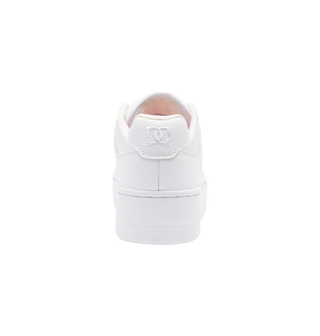 A white sneaker viewed from the back, showcasing the DC logo embroidered on the heel, with a white sole and minimal design on a plain white background—these are the Women’s Manteca 4 Platform Shoes by DC Shoes, perfect for anyone looking for stylish women’s platform sneakers with a clean and modern look.