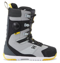 Introducing the Men’s Premier Hybrid BOA® Snowboard Boots by DC Shoes—crafted in a stylish combination of gray, black, and yellow. These boots showcase the advanced BOA® Fit System with a sleek black dial and gray laces, complemented by a rugged sole for exceptional durability. The DC Shoes logo appears on the side near the heel, underscoring their high-performance Premier Hybrid design.