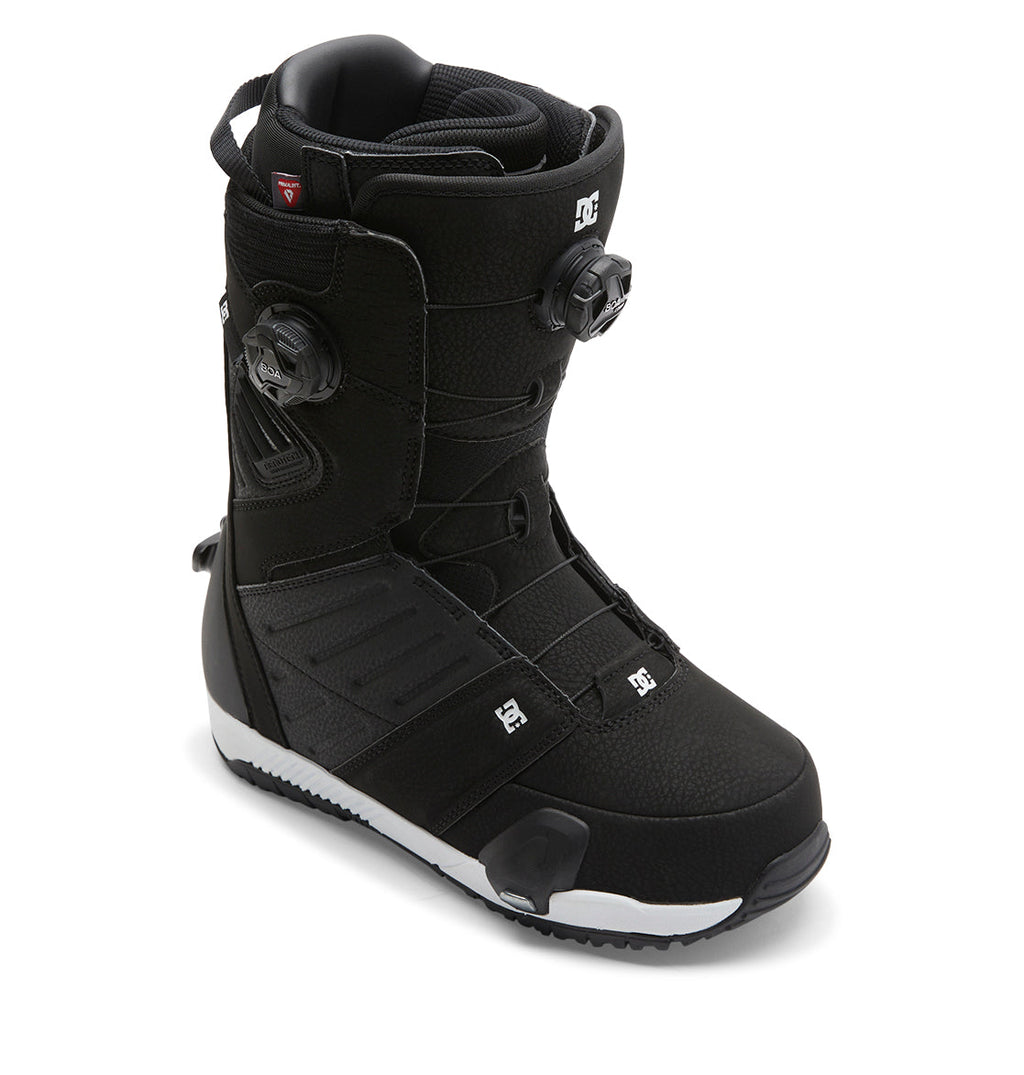 A single Men’s Judge Step On® snowboard boot from DC Shoes in black, featuring a textured surface with prominent DC branding and the advanced Dual Zone BOA Fit System for precise adjustment. The boot’s sole is white and black with a rugged tread, while padded sections provide enhanced comfort and support.