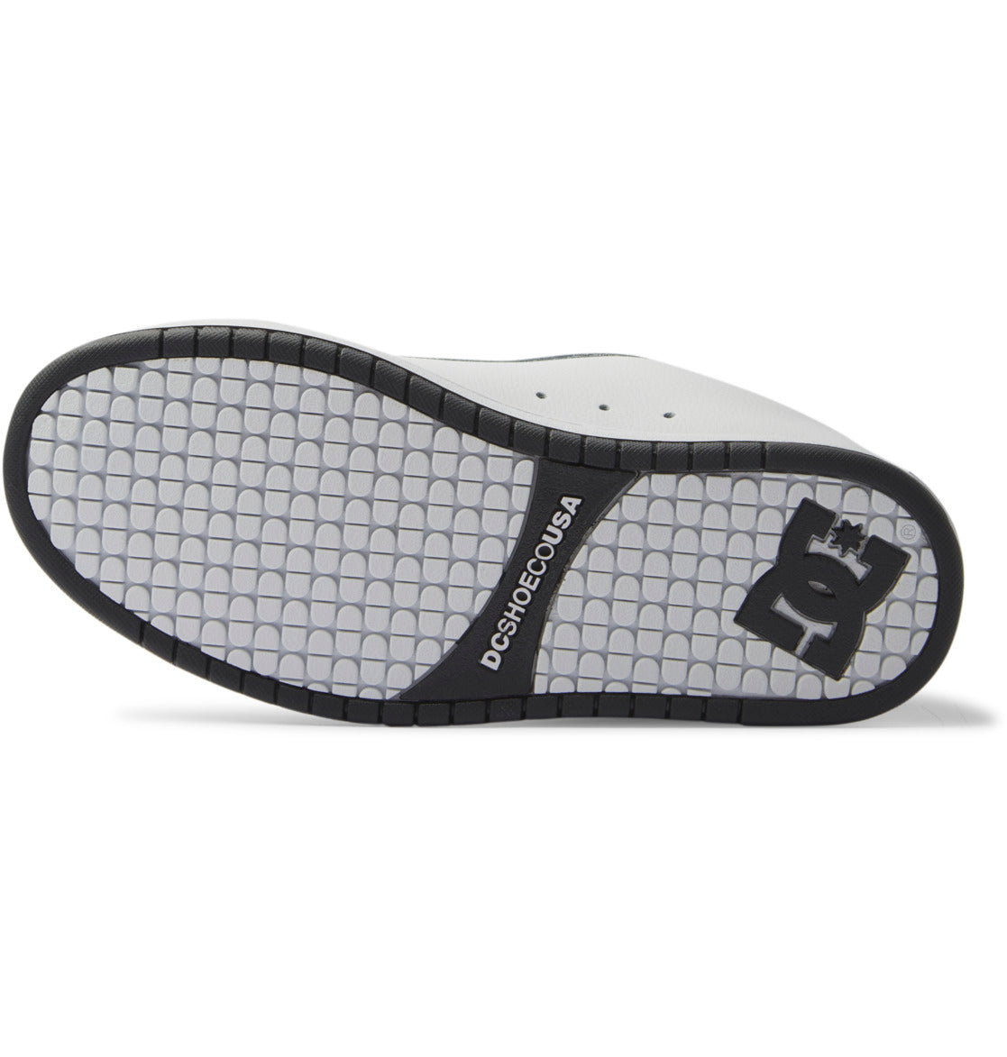The Men’s Court Graffik Shoes by DC Shoes feature a two-tone sole with a distinctive white grid pattern and black borders, showcasing the bold DC Star Logo and the text DCSHOECOUSA on the bottom—a signature detail of these men’s sneakers.