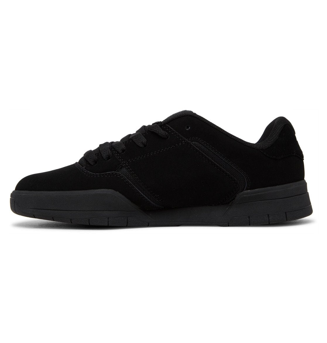 A side view of the Men’s Central Shoes by DC Shoes showcases a black, low-top sneaker with a flat cupsole and matching black laces. Featuring visible stitching details on the upper that emphasize its durability, this simple and unbranded design captures the classic DC style.