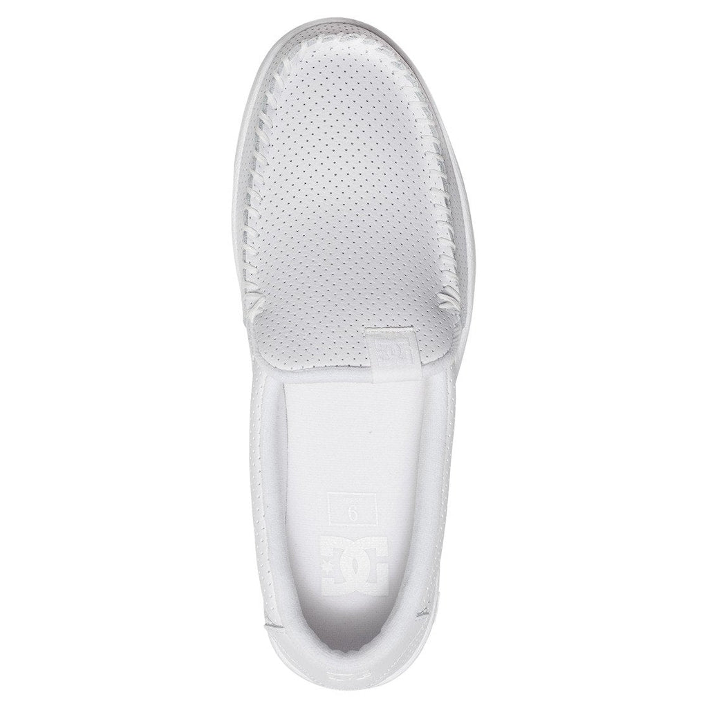 Top view of the Men’s Villain Slip-On Shoes by DC Shoes in white, featuring a lightweight design with perforated detailing on the upper and visible stitching around the toe area, making them perfect as an after-skate shoe.