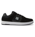 Introducing the Men’s Manteca 4 Shoes by DC Shoes—a black low-top skate shoe featuring a white sole, striking white DC logo on the side, black laces, and showcased against a plain white background. This model blends timeless style with performance-driven design for skaters.