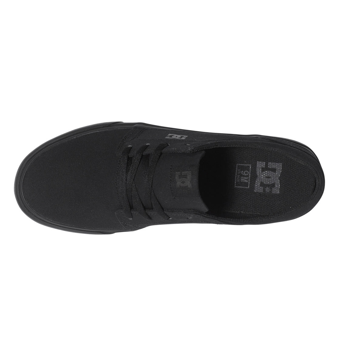 Top view of the DC Shoes Men’s Trase Canvas Shoes in black, featuring laces and visible DC branding on the tongue and insole, with a low-profile silhouette inspired by classic skate style.