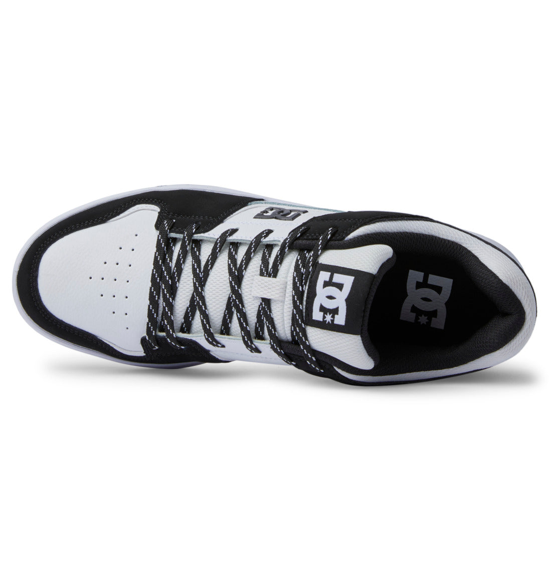 Top view of the Men’s DC Cure Shoes by DC Shoes in black and white, with matching laces, DC logos on the tongue and side, a durable leather upper, and perforated detailing on the white toe—ideal for everyday wear.