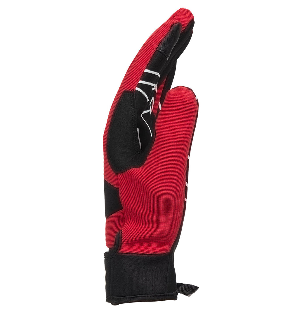 The DC Shoes Trackstar Park Gloves, shown upright in red and black with the palm facing left and fingers slightly curved inward against a white background, feature insulated warmth ideal for use as snow gloves.